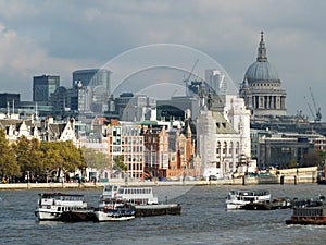 City of london financial district showing current construction work on new large developments, taken from the thames south ban