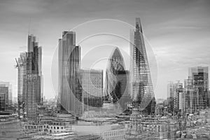 City of London financial district square mile skyline with storm with double exposrue effect