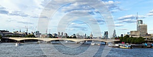 City of London in late afternoon light from Hungerford Bridge.