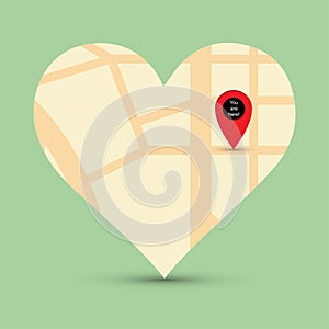 City map in heart shape with a pointer pin up and the text you are here