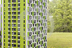 City modern apartment green real estate mixed use building with eco green forest background. Beautiful view housing