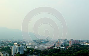 City and mountain in the mist