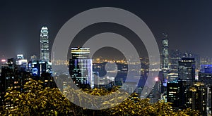 City night scene with business office skyscrapers in Hong Kong,