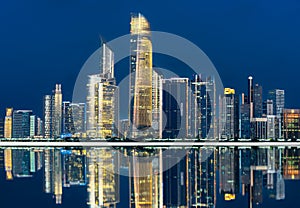 City night view of Abu Dhabi business financial district. United Arab Emirates