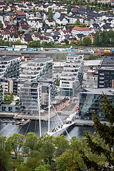 City in Norway from a mountain ridge and forest