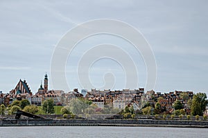 City over the river. Warsaw over the Vistula. The old town is the Polish and Viennese Boulevards. Old and owen parts of the city.