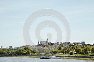 City over the river. Warsaw over the Vistula. The old town is the Polish and Viennese Boulevards. Old and owen parts of the city.