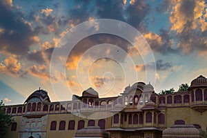 City Palace at Jaipur, capital city of Rajasthan, India. Architectural details with scenic dramatic sky at sunset.