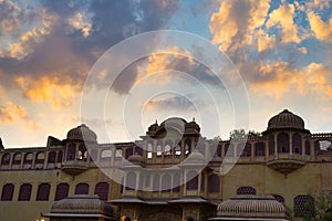 City Palace at Jaipur, capital city of Rajasthan, India. Architectural details with scenic dramatic sky at sunset.