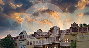 City Palace at Jaipur, capital city of Rajasthan, India. Architectural details with scenic dramatic sky at sunset.