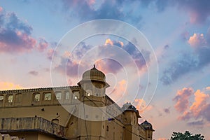 The City Palace at Jaipur, capital city of Rajasthan, India. Architectural details with scenic dramatic sky at sunset.