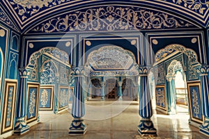 City Palace Jaipur interior medieval architecture with intricate wall art at Rajasthan, India