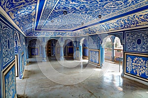 City Palace Jaipur interior medieval architecture with intricate wall artwork at Rajasthan, India