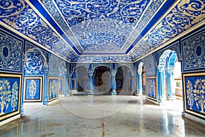 City Palace Jaipur interior medieval architecture with intricate wall artwork at Rajasthan, India