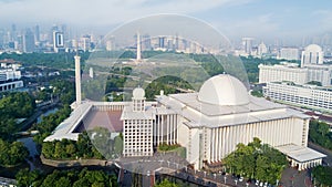 City panorama with Istiqlal Mosque photo
