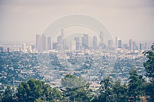 City panorama of Los Angeles and Griffith Park. Smog over the city