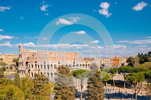 City panorama Rome, Italy Colosseum or Coliseum ancient ruins background blue sky with clouds