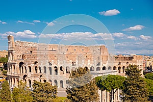 City panorama Rome, Italy Colosseum or Coliseum ancient ruins background blue sky stone arches and sunset