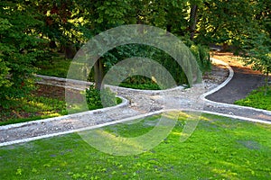 City park with paved path under construction