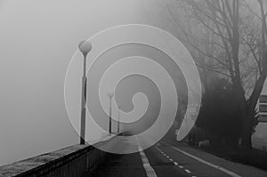 City path in foggy weather