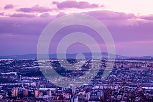 The city of Pecs at a purple sunset in Hungary, Europe