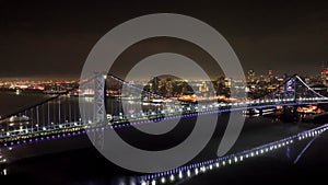 City of Philadelphia and Ben Franklin Bridge by night - aerial footage