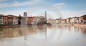 The city of Pisa along the Arno river
