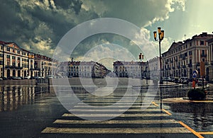 City plaza at rainy day in Cuneo, Italy.