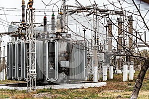 City power substation, close-up, transformer with high-voltage wires