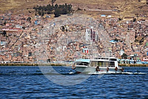 City of Puno on the shore of Lake Titicaca, Peru photo