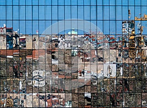 City reflections in new building glass