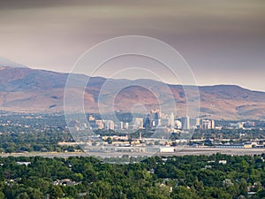 City of Reno Nevada cityscape in at dawn during a smog inversion.