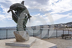 The city of Rethimno owes its name to this statue with the two dolphins, Crete, Greece