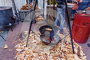 City Riga, Latvia. Street Restaurant food festival. On the fire is being prepared to eat