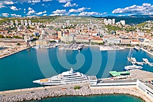 City of Rijeka waterfront and luxury yacht harbor aerial view