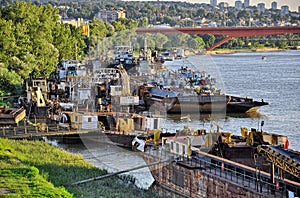 City river with old cargo ships