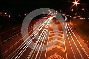 City road with car light streaks