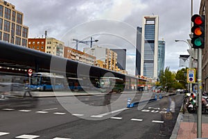 City. Road in Plaza Castilla full of vehicles, cars, motorcycles, buses and public transport, in Madrid