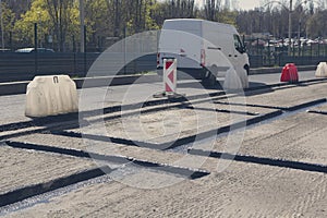 City road repair in asphalt pavement