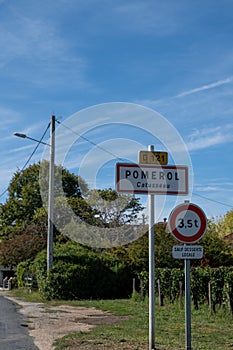 City road sign in Pomerol village, production of red Bordeaux wine, Merlot or Cabernet Sauvignon grapes on cru class vineyards in