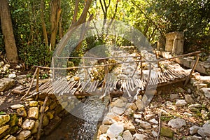 City ruins Olimpos bridge through a stream