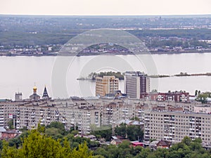 The city`s skyline. The architecture of the city of Saratov, Russia. The Volga river and the city of Engels on the horizon