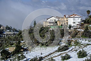 The city of Safed covered with snow photo