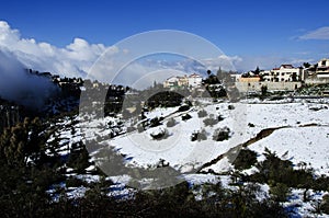 The city of Safed covered with snow photo
