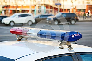 City safety. Police car on duty in urban street