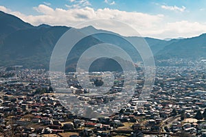 City scape view from Chureito Pagoda near moutain Fuji photo