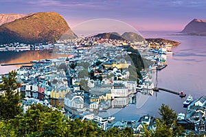 City Scene with Aerial View of Alesund Center in The Early Morning Sunshine