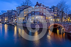 City scenic from Amsterdam at the Keizersgracht in the Netherlands at sunset