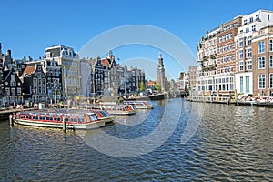 City scenic from Amsterdam with the Munt tower in the Netherlands photo