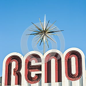 City sign of Reno with sky